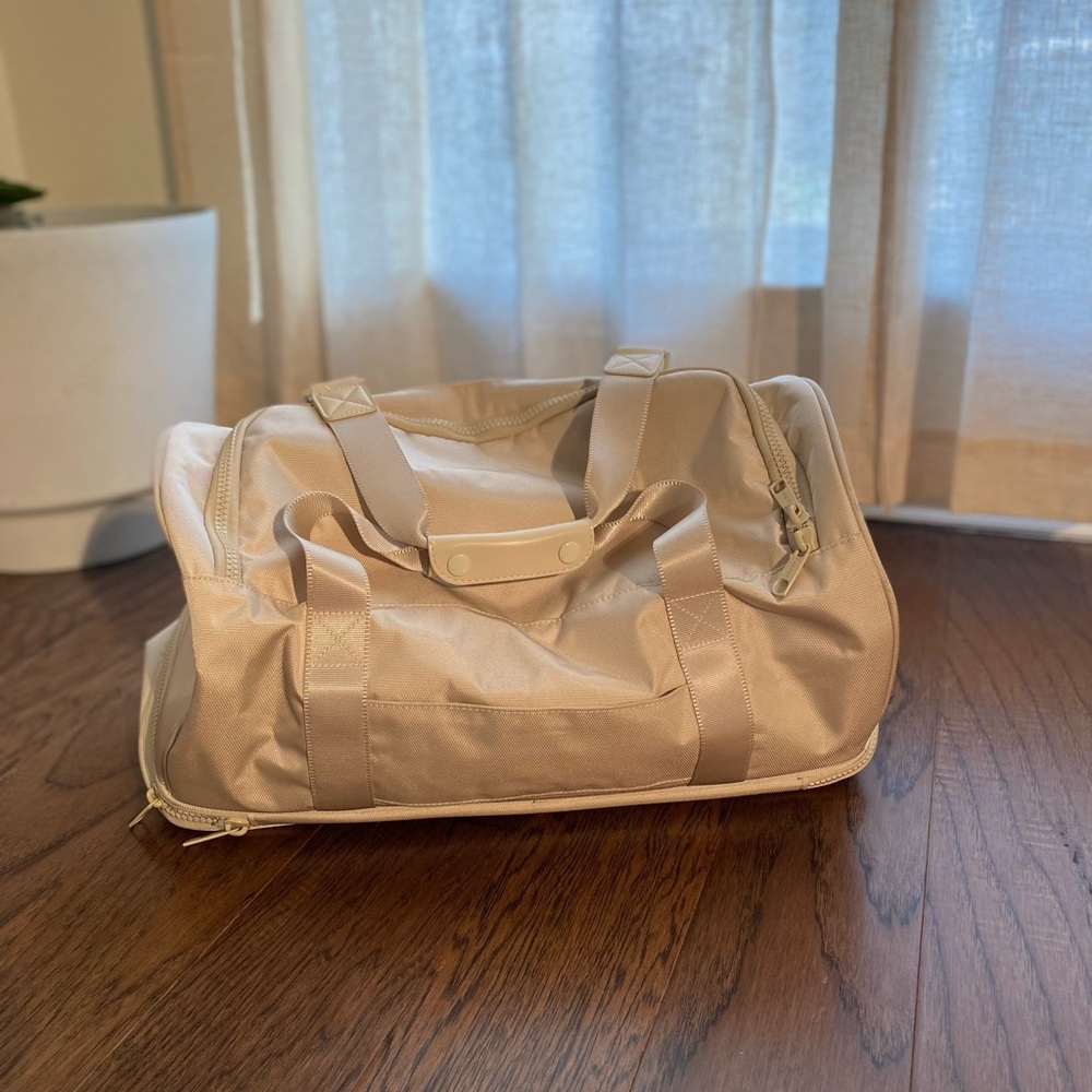 Calpak Stevyn Duffel Bag with Shoe Compartment in Dune